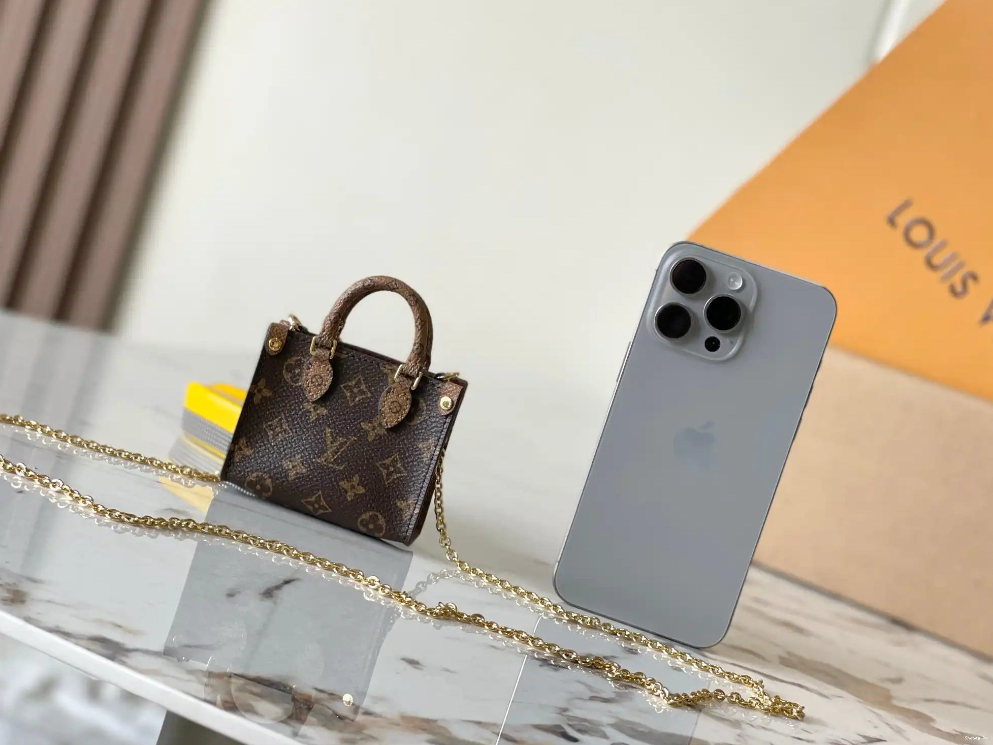 LOUIS MICRO-8.5*3.5*10.5CM ONTHEGO VUITTON 0627